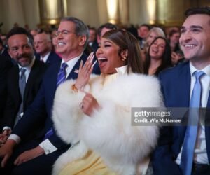 Musician Nicki Minaj laughs during remarks by U.S. President Donald Trump