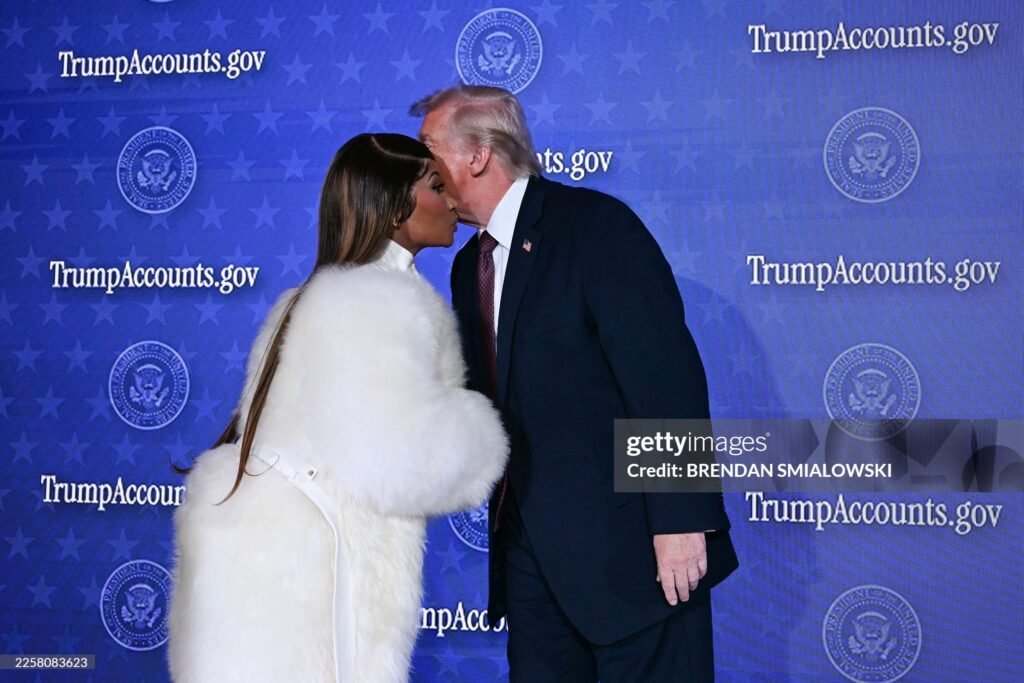 US President Donald Trump (R) greets Trinidadian rapper and singer-songwriter Nicki Minaj during an event on 'Trump Accounts' at the Andrew W. Mellon Auditorium in Washington, DC, on January 28, 2026. as she says she is his number one fan.