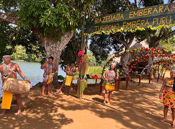 Embera people welcome tourists in song at their village up the Chagres River in Panama (NewsAmericasNow.com image)