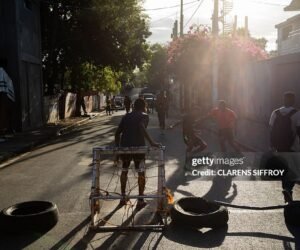 Young boys play football with makeshift gear in Delmas, Port-au-Prince, Haiti, on March 22, 2026.
