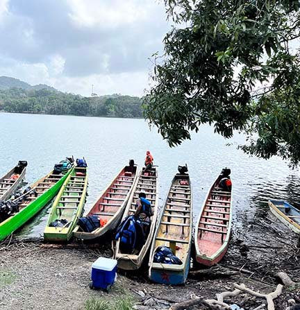Motorized canoes wait to ferry tourists to the Embera Village in Panama. (NewsAmericasNow.com image)
